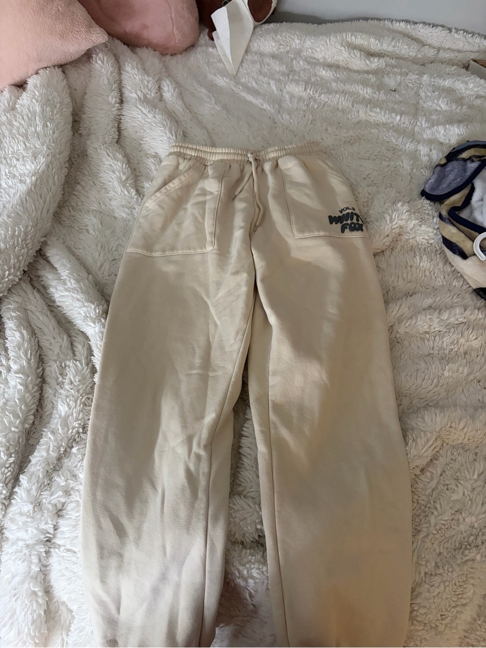 Sweat pants cuffed